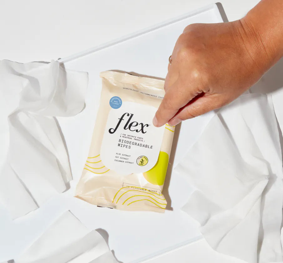 a-person-opening-a-pack-flex-biodegradable-wipes.webp